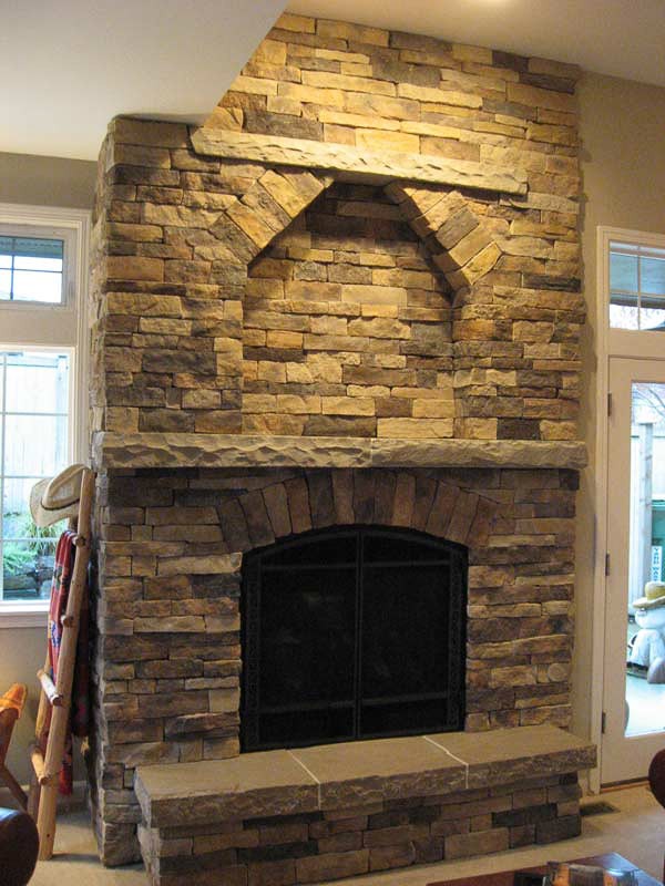 Cultured Stone Fireplace With Sandstone Hearth And Mantel