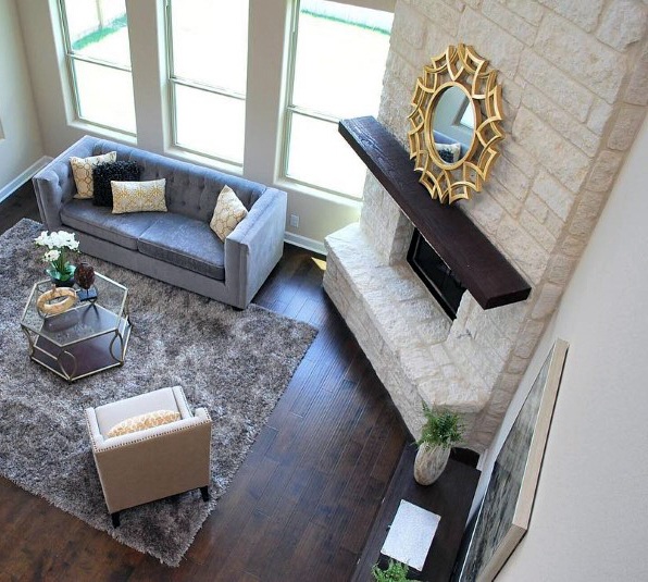 White Stone Wall Corner Fireplace Design In Living Room